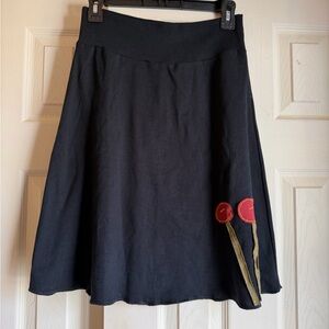 Chic Black A-Line Skirt with Red Floral Accents